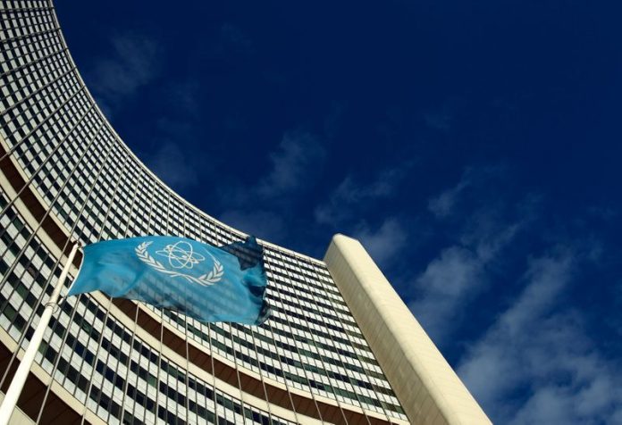 The flag of the International Atomic Energy Agency IAEA flies in front of its headquarters during a board of governors meeting in Vienna